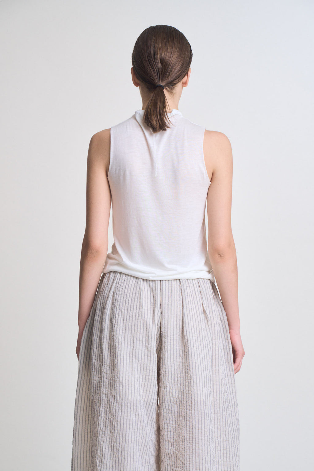 Cut And Sew Sleeveless Mock Neck Top in Off White