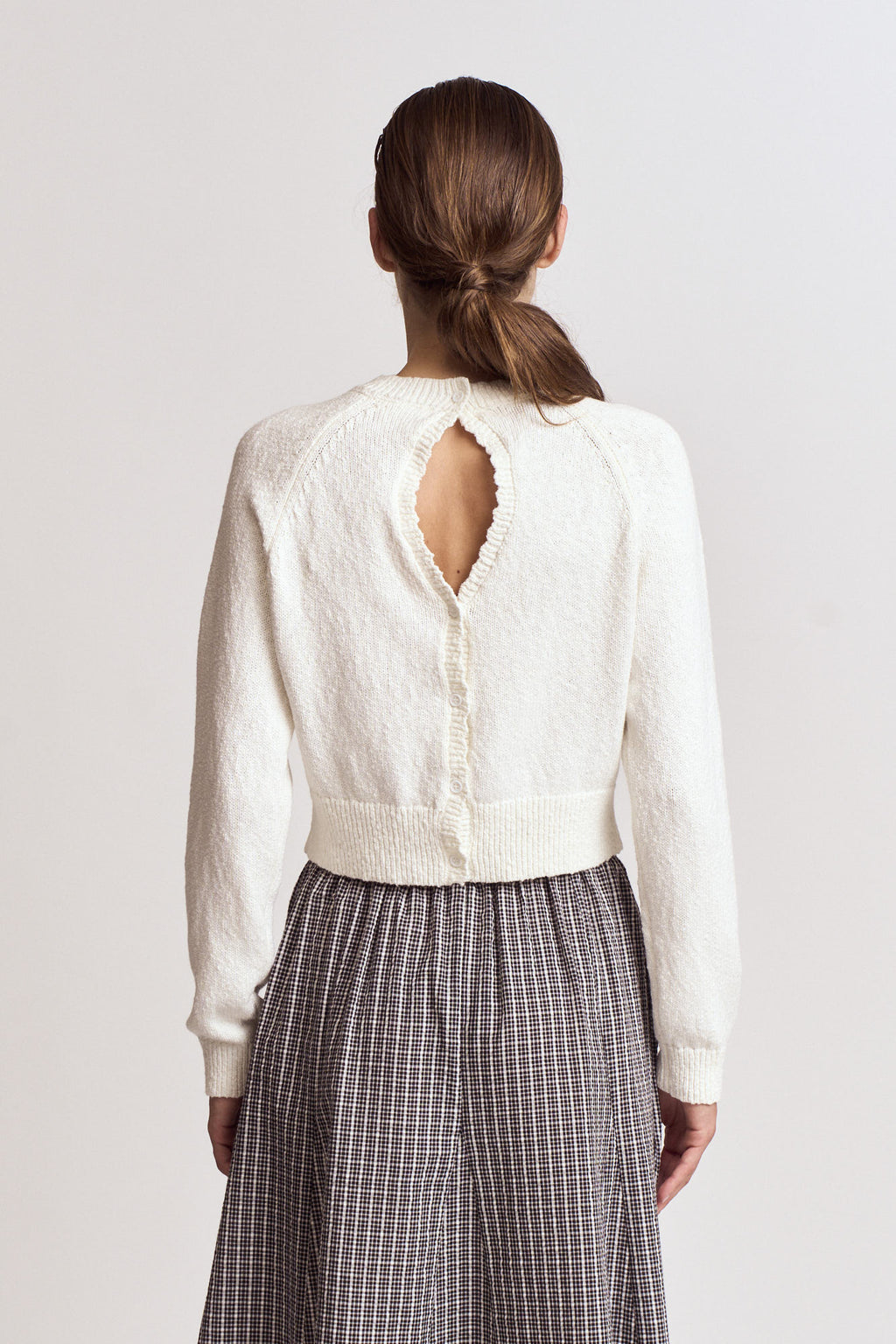 Cut Out Back Button Knit Top