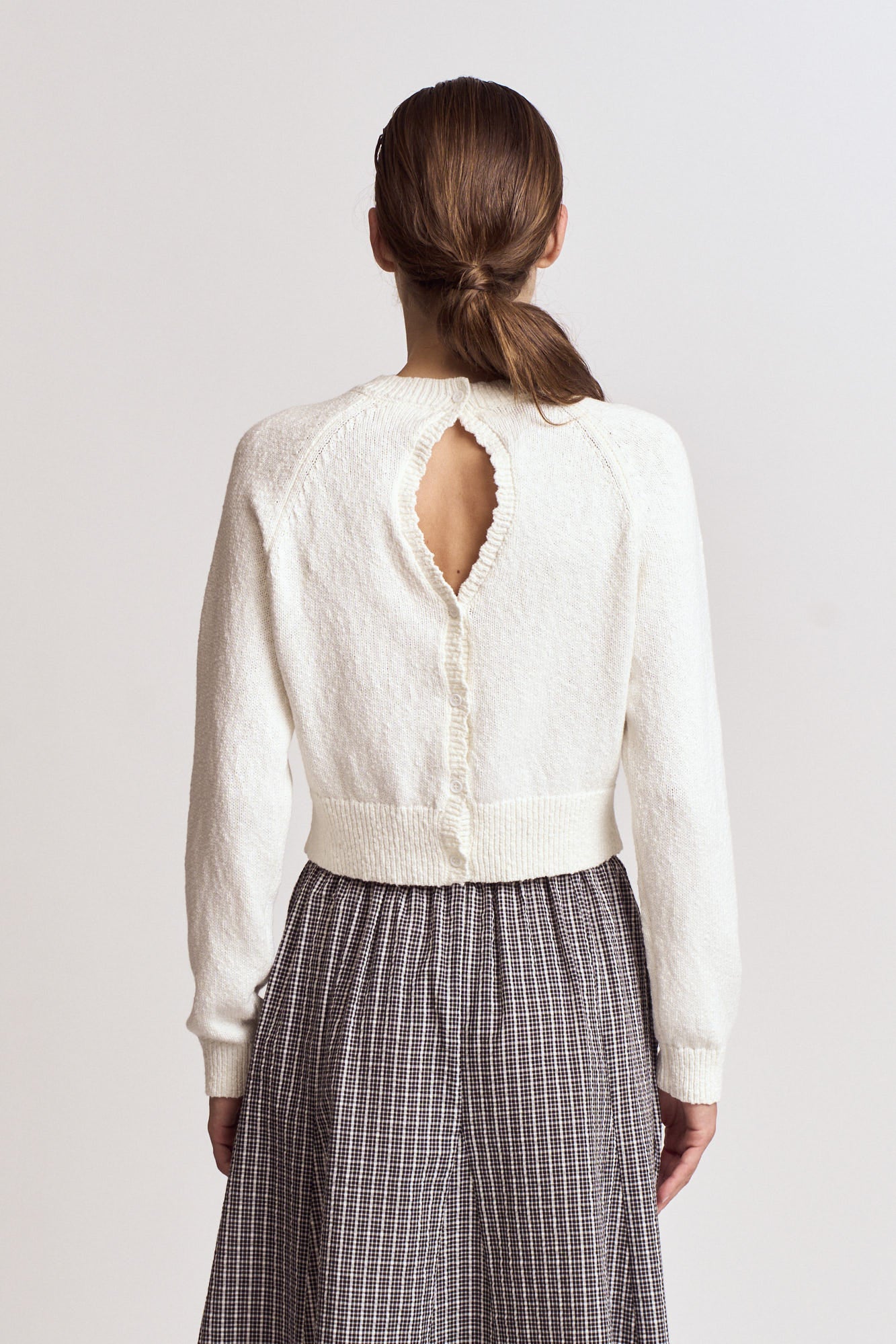 Cut Out Back Button Knit Top