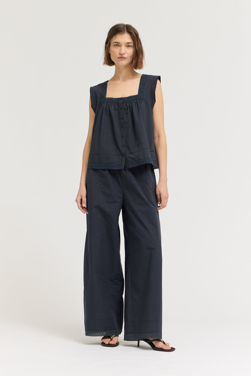 Eyelet Trim Detailed Sleeveless Top in Atlantic