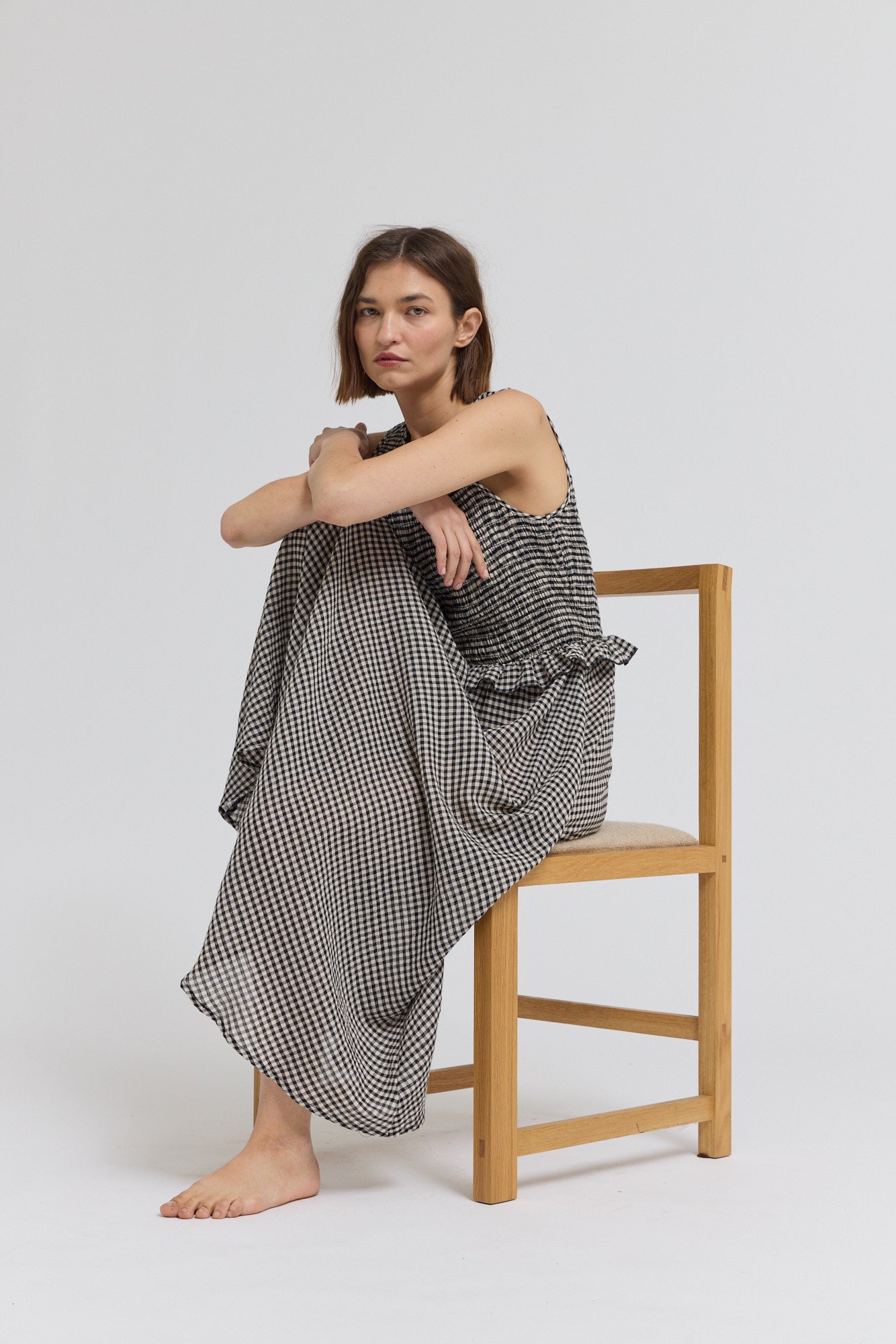 Sleeveless Smocking Top Dress in Black